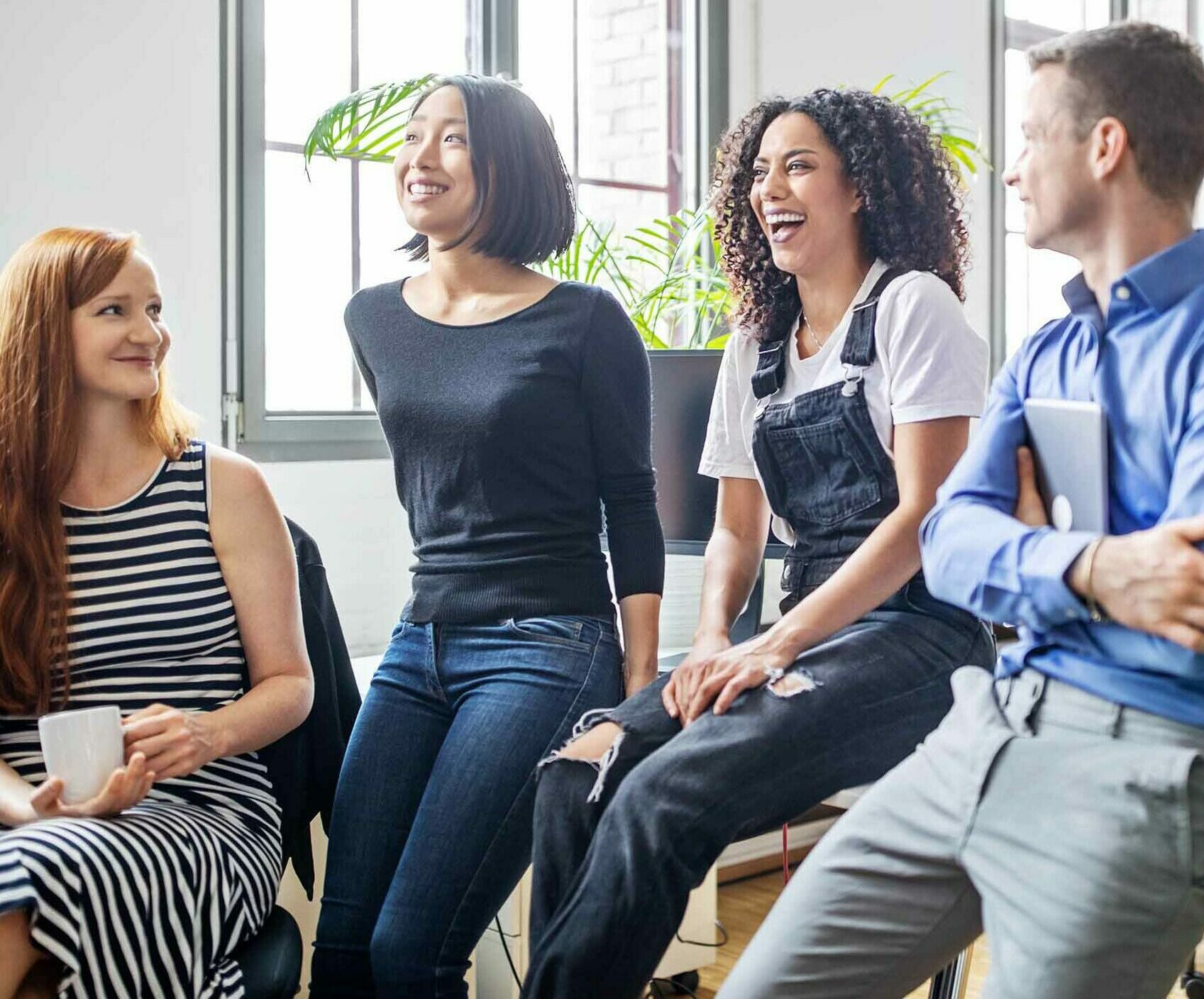 employees in office laughing