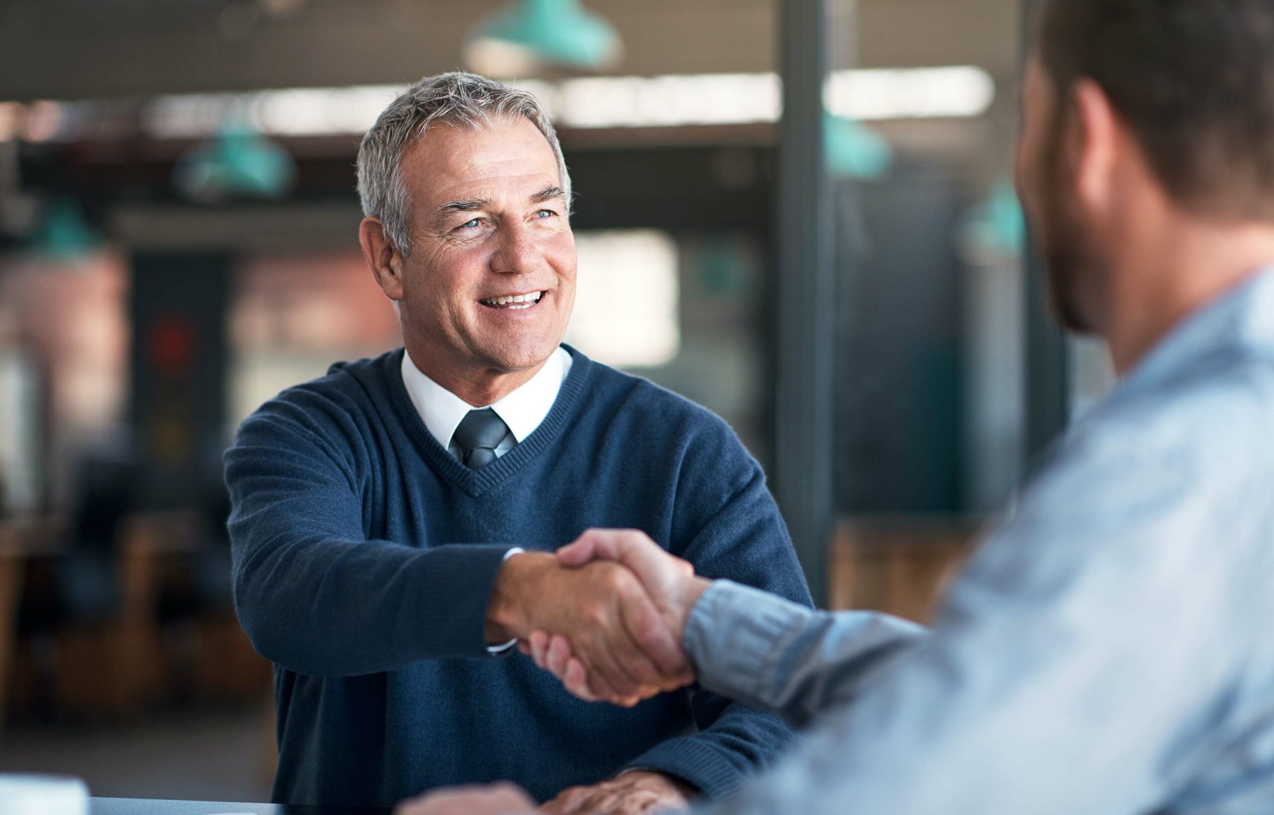 two men shaking hands