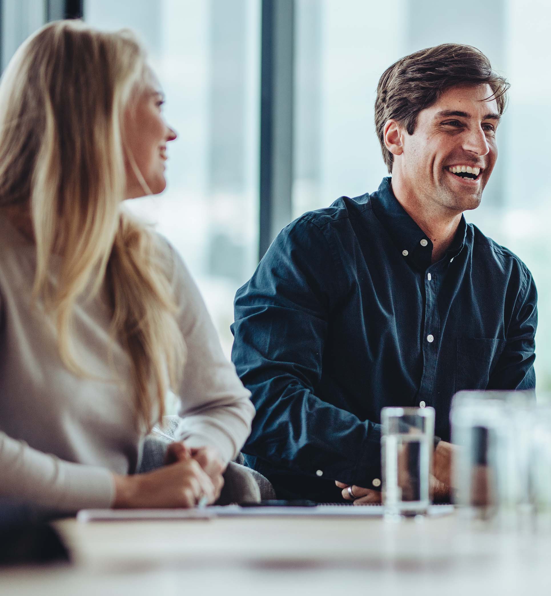 man and woman in meeting